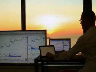 business people have a meeting about company statistics